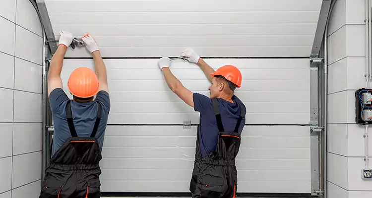 Garage Door Bottom Panel Repair in East Lake-Orient Park, FL